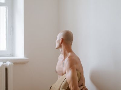 Quiet corner with plants and yoga equipment.